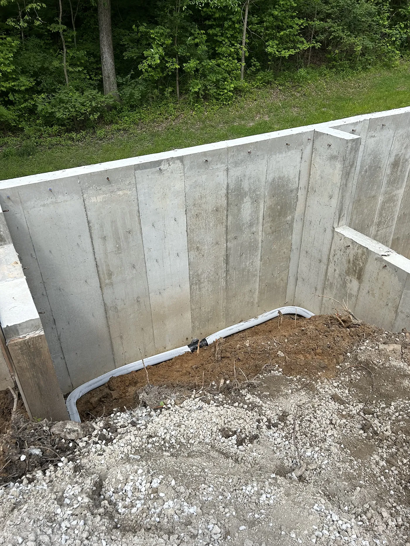 ASA Construction SVC. LLC - Belleville IL - Backfilling in Behind Wall to Raise Ground