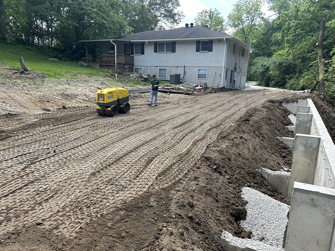 ASA Construction SVC. LLC - Belleville IL - Backfilling in Behind Wall to Raise Ground