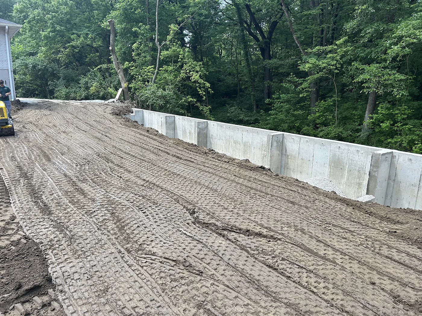 ASA Construction SVC. LLC - Belleville IL - Backfilling in Behind Wall to Raise Ground