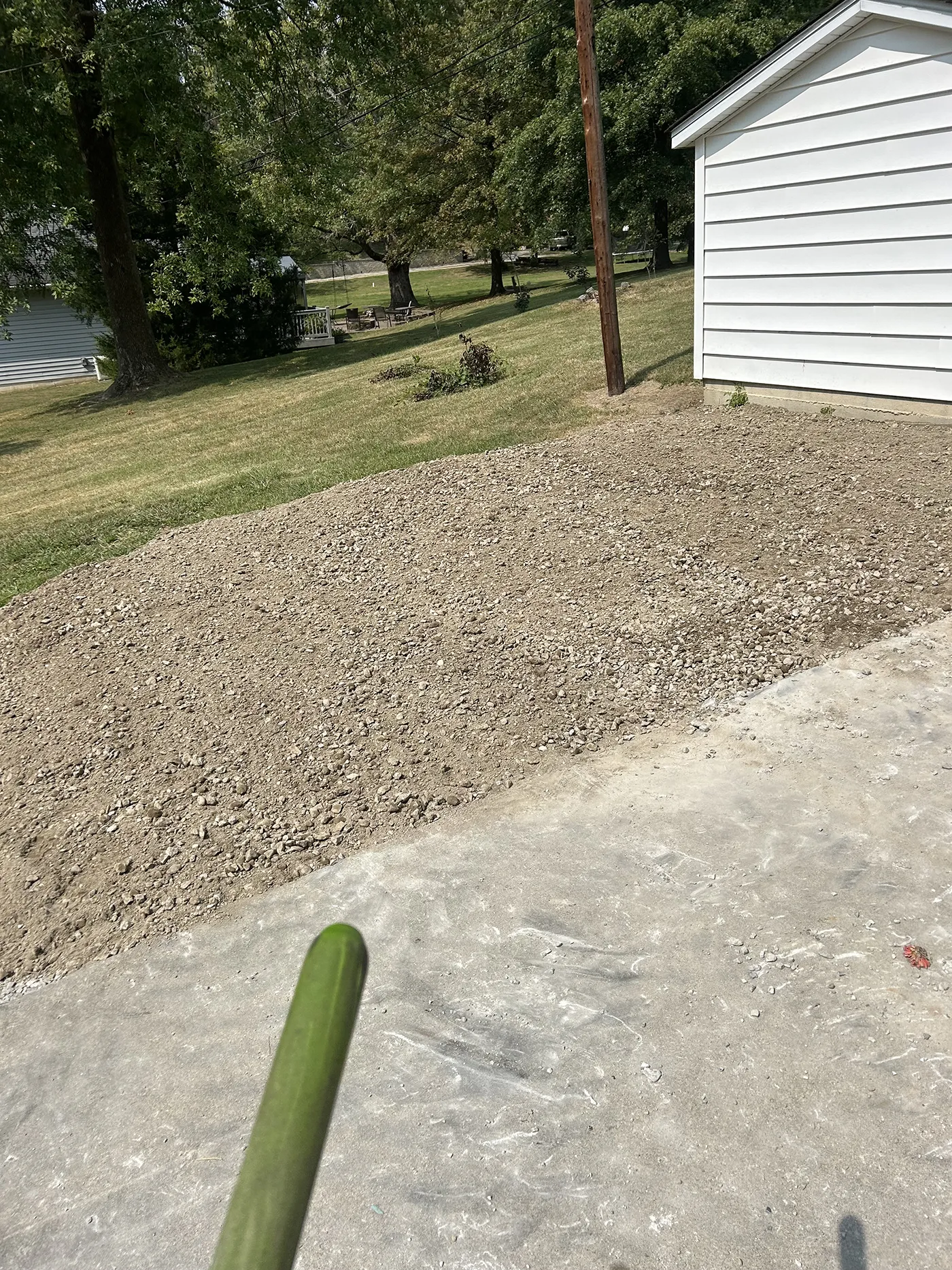 ASA Construction SVC. LLC - Belleville IL - Added 3 Inch Rock With Weed Barrier Along Driveway to Prevent Washout