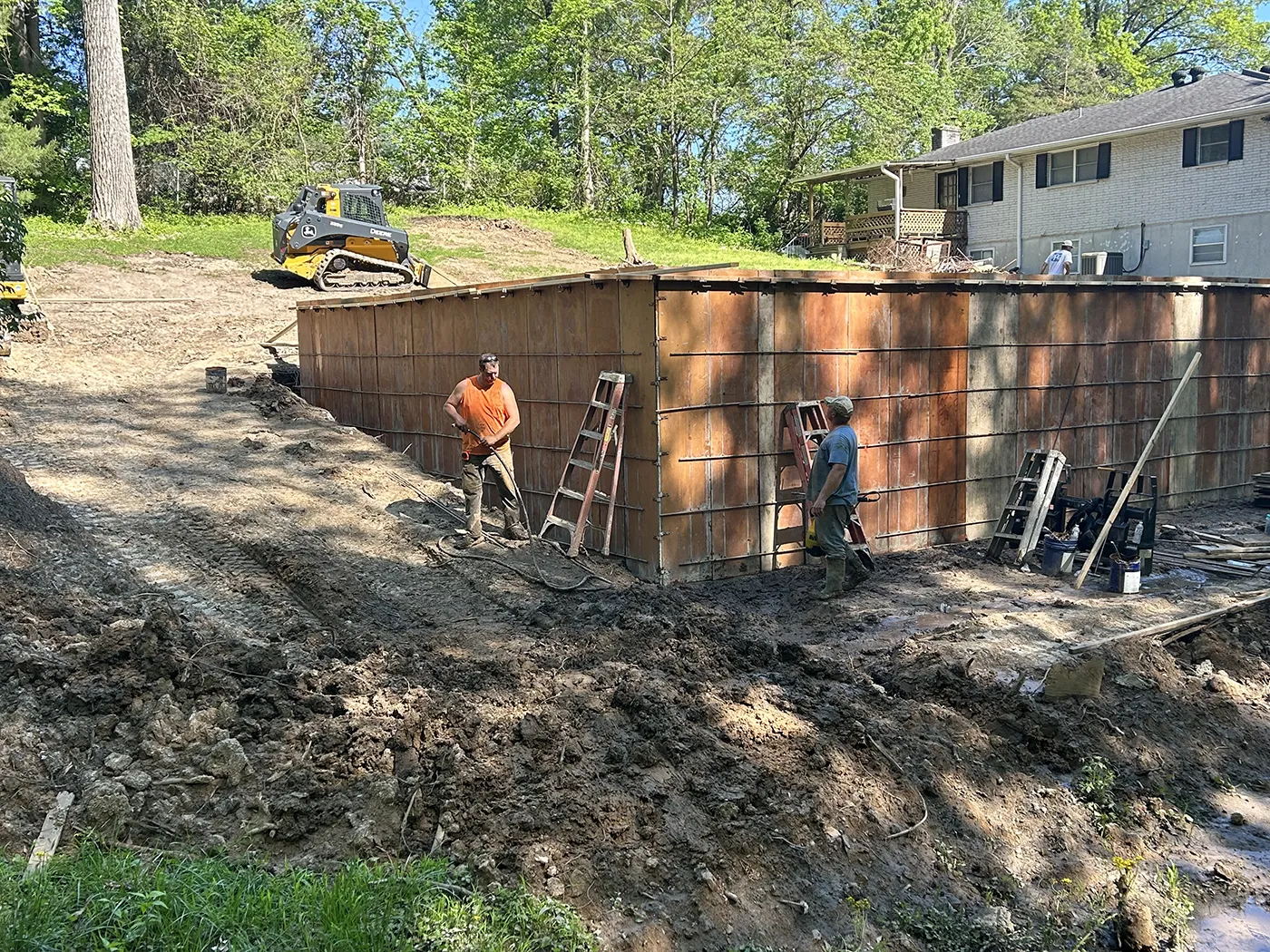 ASA Construction SVC. LLC - Belleville IL - Footing and Retaining Wall Poured for a Site Prep for Shed