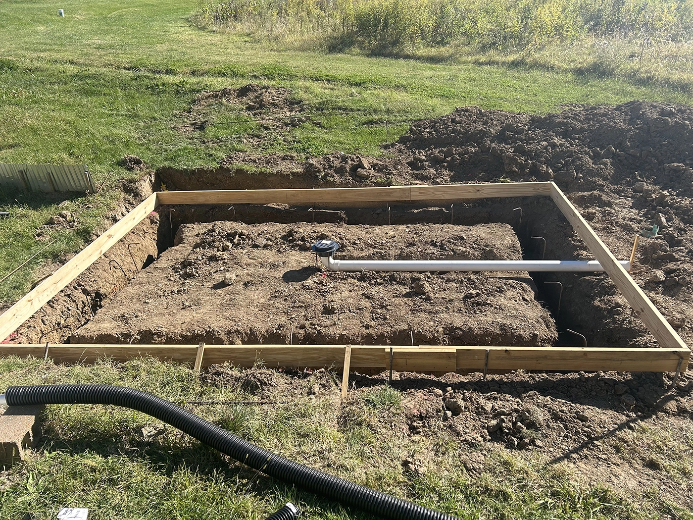 ASA Construction SVC. LLC - Belleville IL - Pump Pad With Footing and 8 Inch Drain Along With 8x75 Driving Range Pad