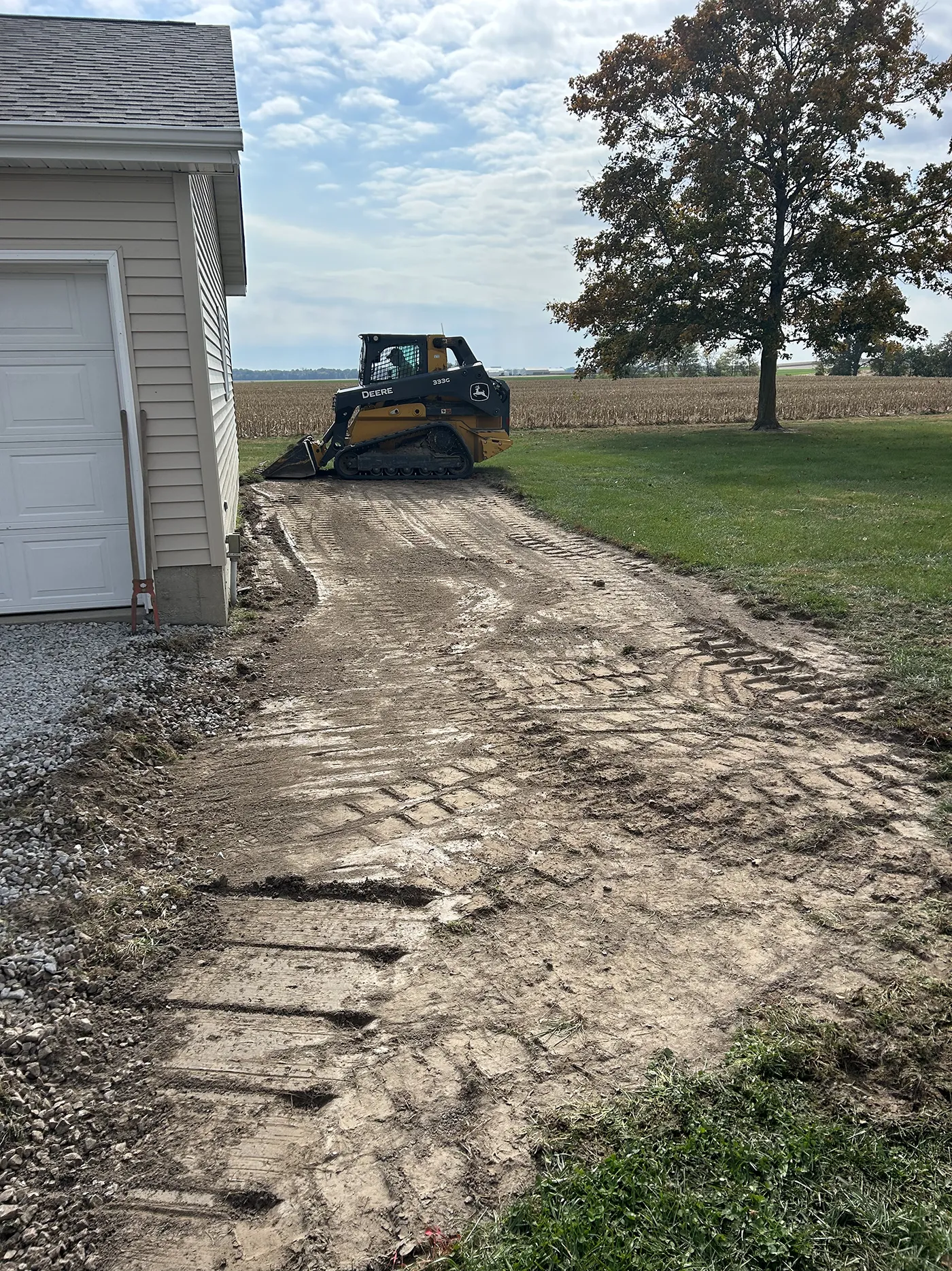 ASA Construction SVC. LLC - Belleville IL - Added Onto Driveway & Rerocked With Weed Barrier